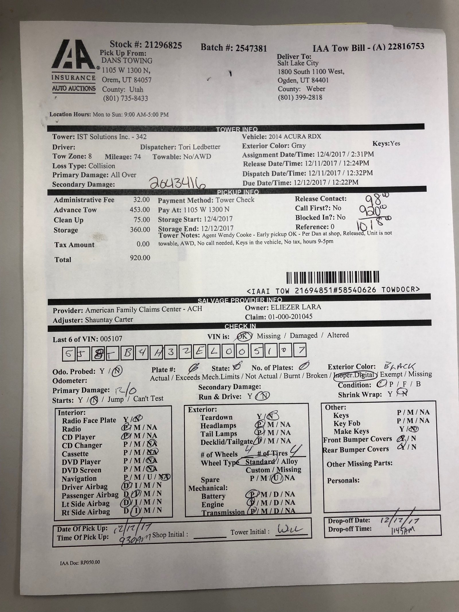A photo of the partner's paper vehicle inventory form: dense rows of checkboxes and fields covering the whole page.